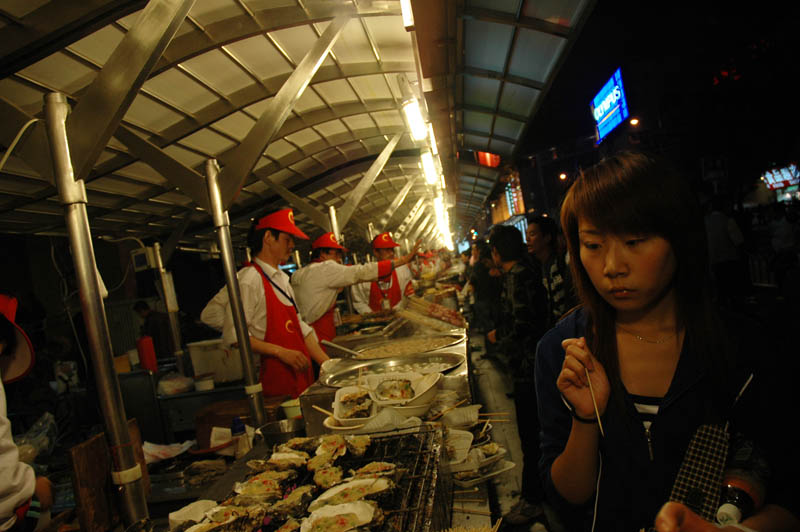 Oysters. For the National Holiday, this was without doubt the longest restaurant counter - it continued unbroken for an entire city block